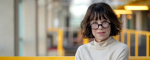 Maura Grossman in Davis Centre banner