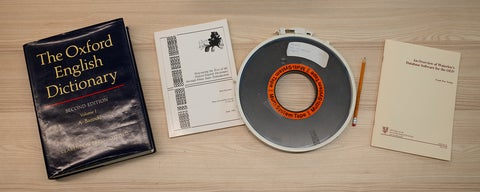 banner image of Oxford English dictionary, two reports and magnetic computer tape