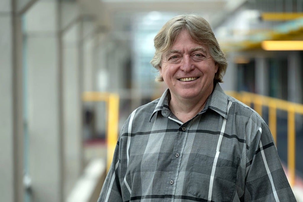 headshot of Lawrence Folland inside Davis Centre