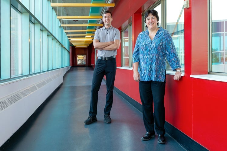 Photo of Fiodar Kazhamiaka and his co-supervisor Professor Catherine Rosenberg