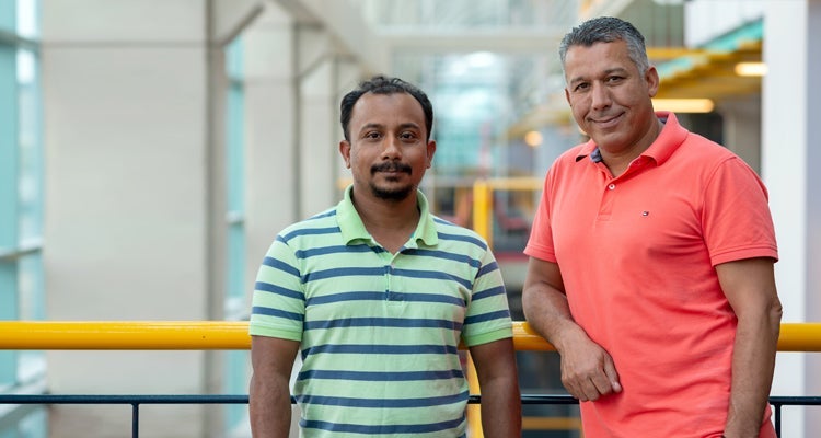 photo of Nashid Shahriar and Professor Raouf Boutaba
