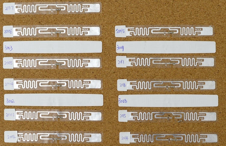 photo of RFIDs with phototransistor and thermister hacks
