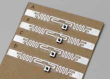 picture of push-button hack of RFID tags to make wireless clicker